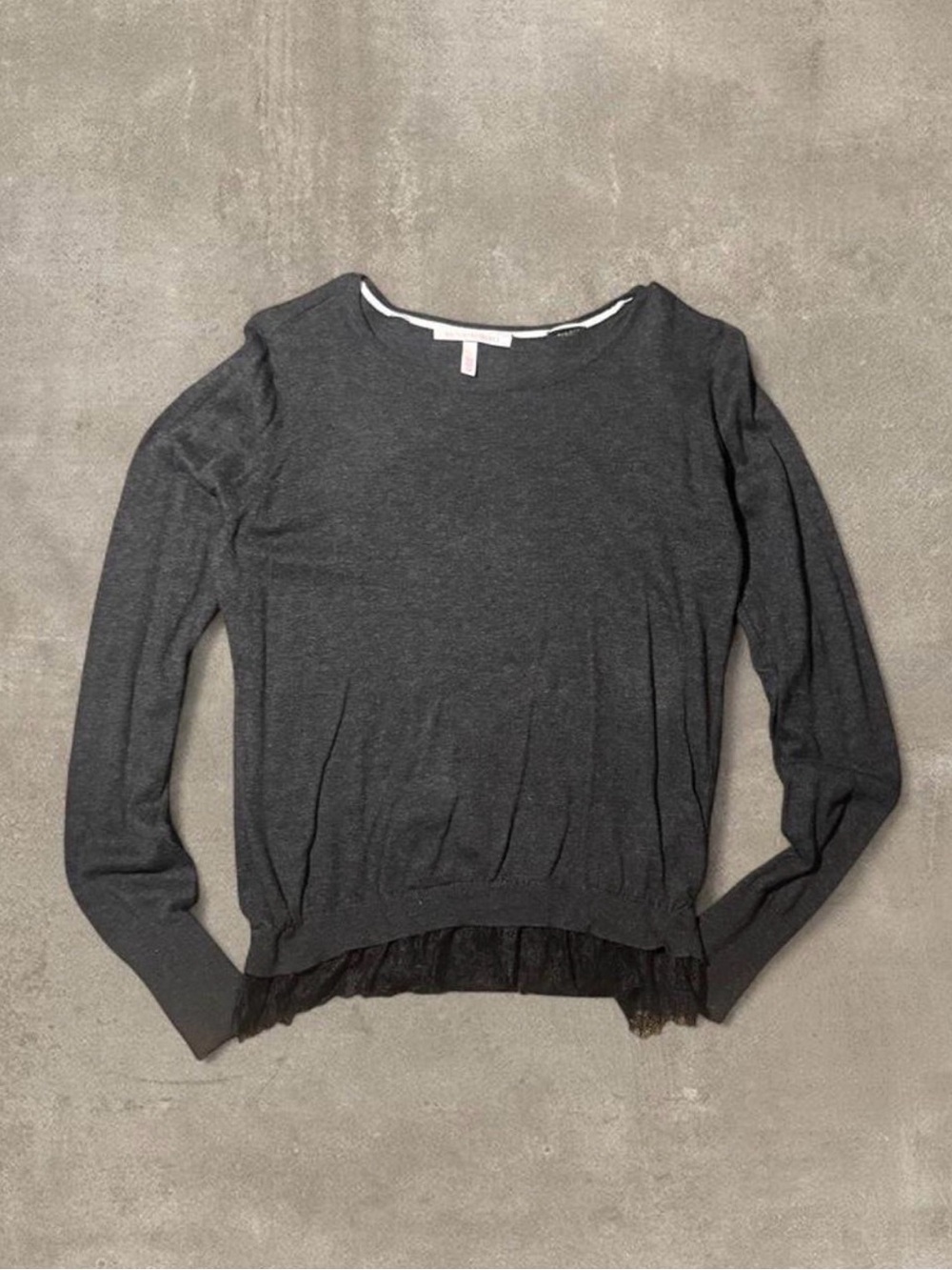Victoria's Secret black long sleeve top with ruffle hem